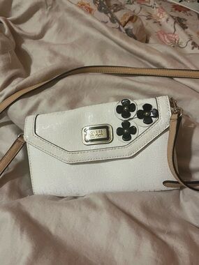 GUESS White Crossbody with Black Floral Appliqués and Tan Strap